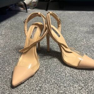 Beige Pointed-Toe Slingback Heels with Clear Side Panels